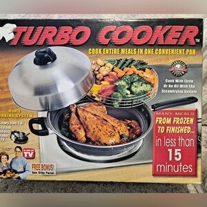 The Turbo Cooker 4-in-1 Cooking System, Steam, Roast, Bake, Fry, new in box.